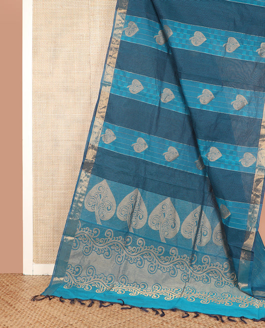 Blue Coimbatore Cotton Saree Delicately Designed with Stripes, Checks, and Buttas All Over Its Body, Subtly Zari Border, Sparsely Woven Pallu of Floral-Leaf Designs, and Paired with a Matching Blouse