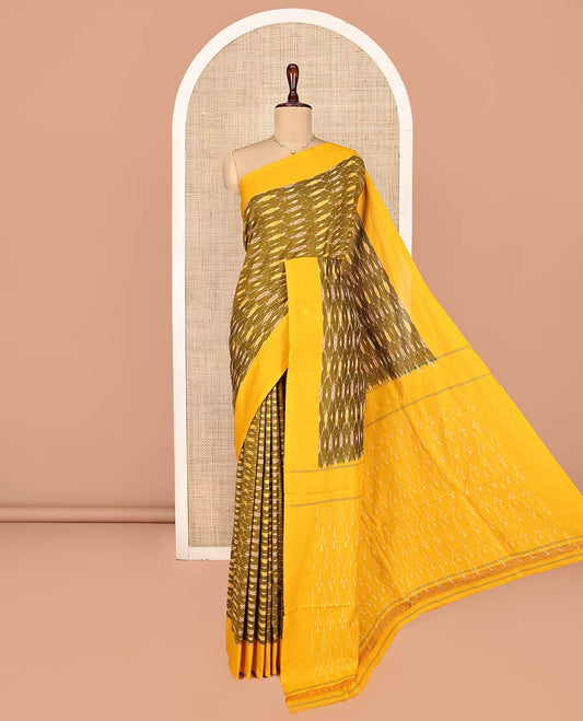 Green Ikkat Cotton Saree, Adorned with Ikkat-Style Ogee Patterns on Its Body, Complemented by Contrast Plain Border, Pallu of Ikkat Designs, and Has No Blouse