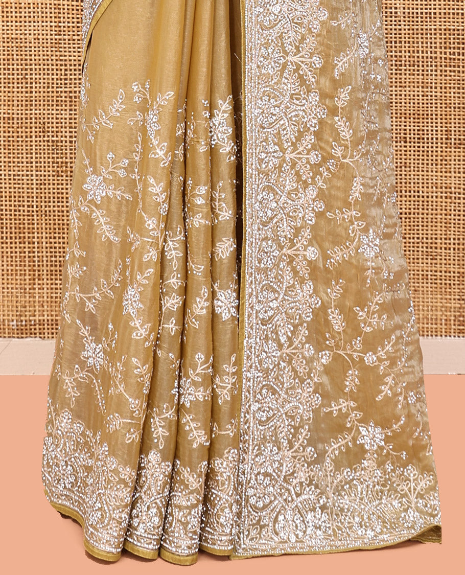Champagne Gold Designer Saree, Gleamed up with Floral Vine Stone Embroidery, a Stone Embroidered Border, and a Matching Blouse