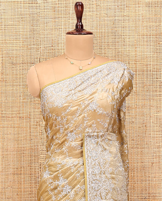 Champagne Gold Designer Saree, Gleamed up with Floral Vine Stone Embroidery, a Stone Embroidered Border, and a Matching Blouse