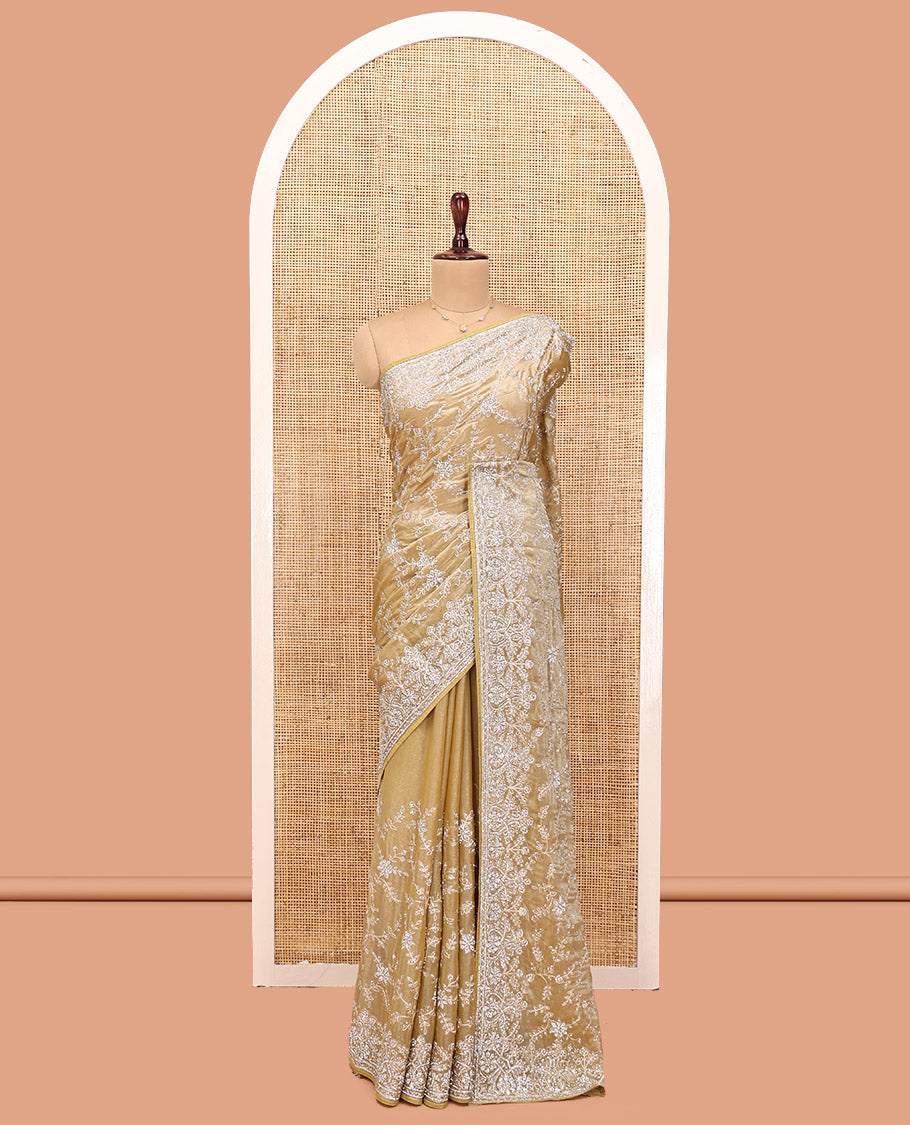 Champagne Gold Designer Saree, Gleamed up with Floral Vine Stone Embroidery, a Stone Embroidered Border, and a Matching Blouse