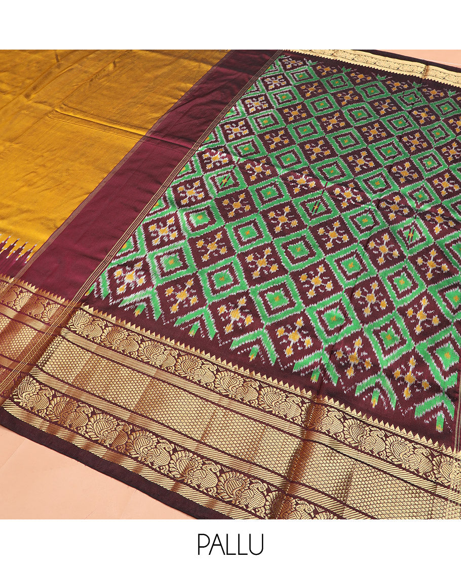 Mustard Plain Ikkat Silk Saree, Complemented by a Contrast Temple Traditional Zari Motif Woven Border, Pallu Adorned with Vibrant Jaal Design, and Paired with a Multi-Coloured Blouse