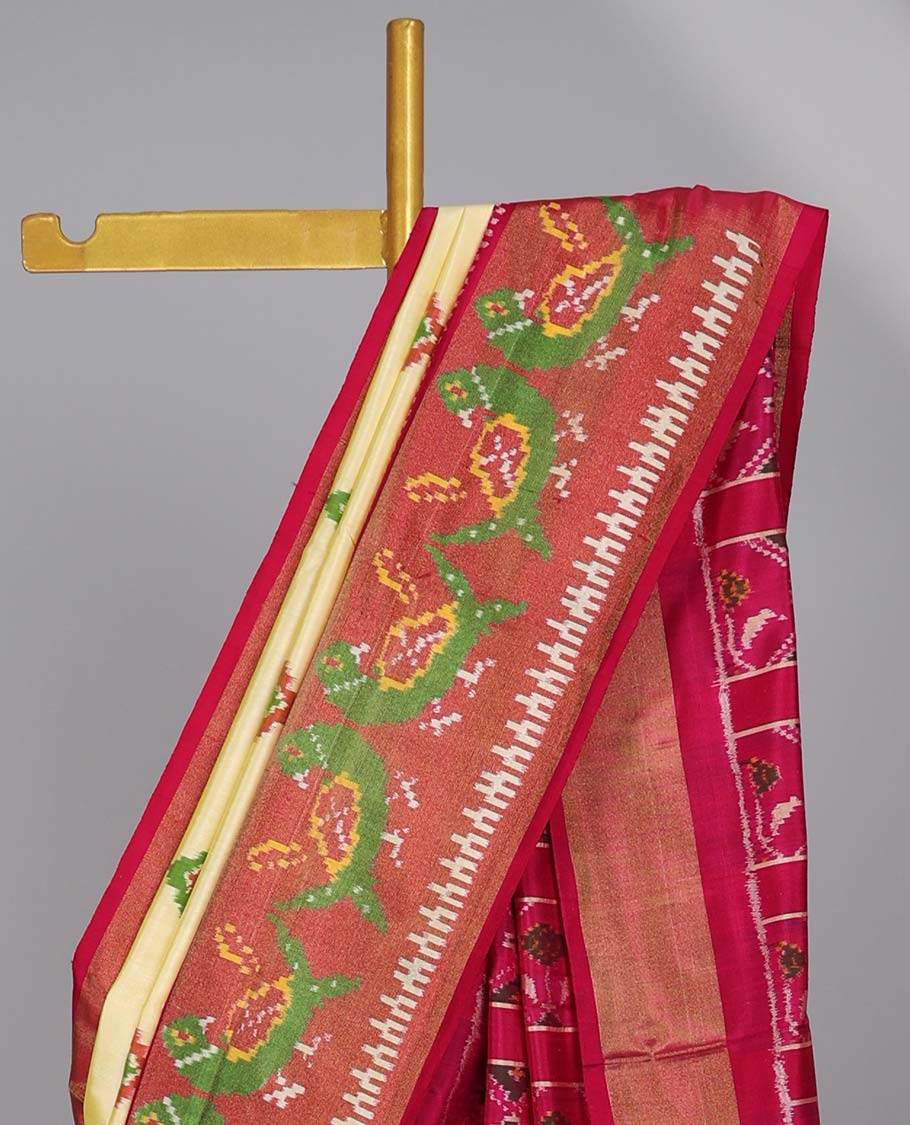 Yellow with motifs ikkat silk saree, contrast peacock border &  floral design pallu