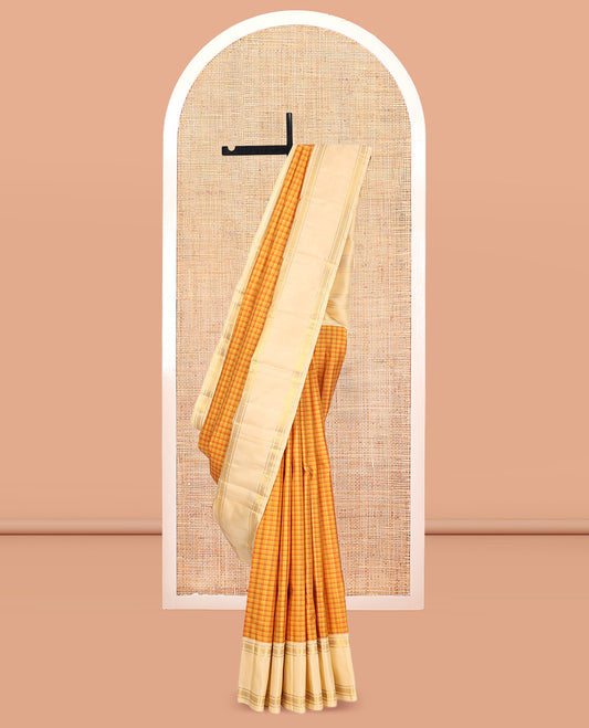 Yellow Checked Kanchipuram Silk Saree, Complemented by a Contrast Border of Muthu, Banaras, and Kuyil Kann Designs, Zari Woven Pallu, and Contrast Blouse