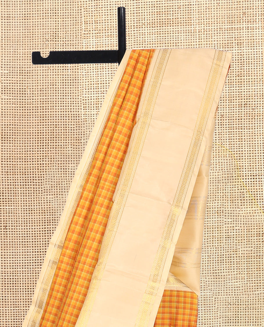 Yellow Checked Kanchipuram Silk Saree, Complemented by a Contrast Border of Muthu, Banaras, and Kuyil Kann Designs, Zari Woven Pallu, and Contrast Blouse