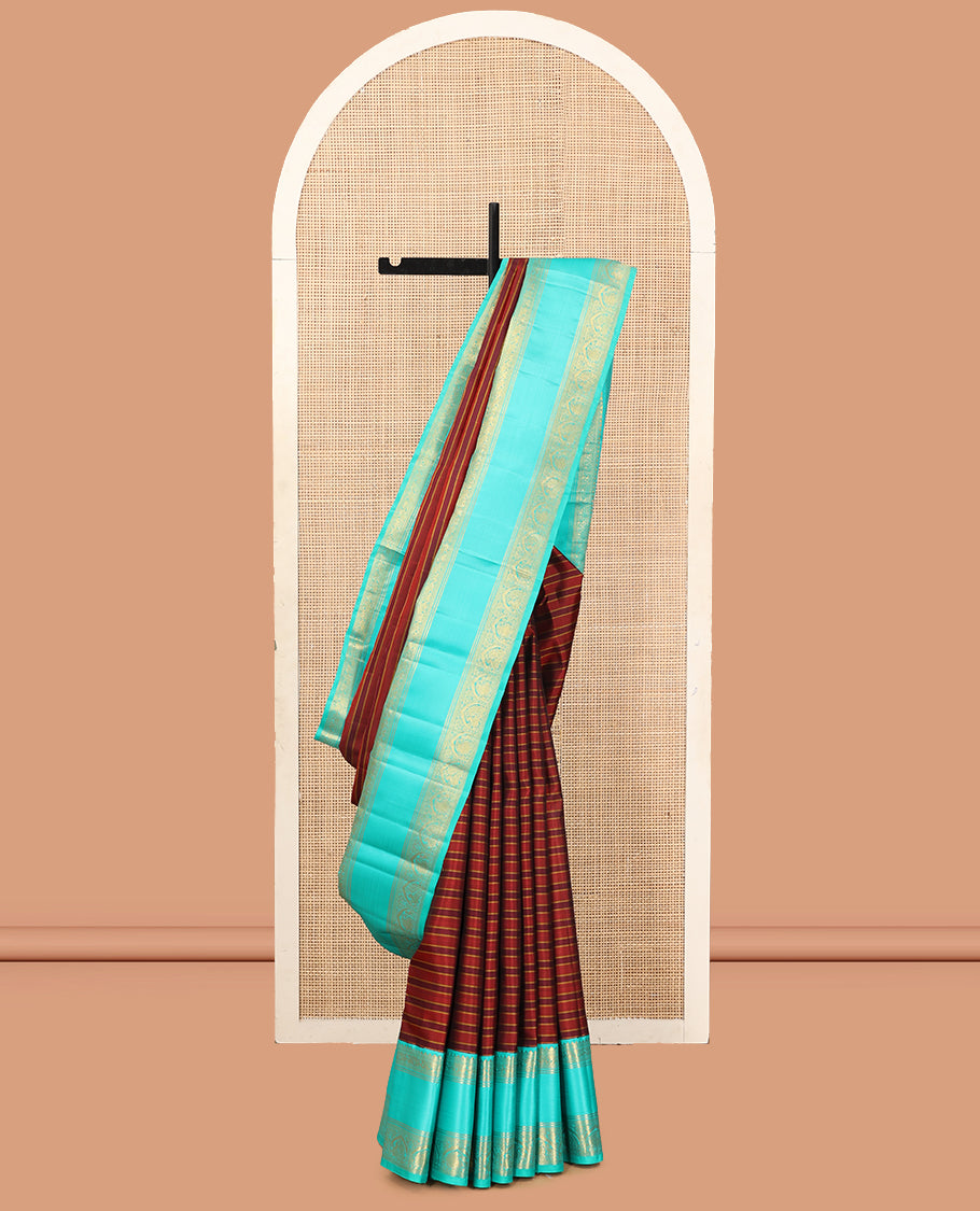 Brown Striped Kanchipuram Silk Saree, Complemented by a Contrast Border of Rekku, Muthu, Neli, Mayil, and Arumbu Manga Designs, Grand Pallu, and a Contrast Blouse