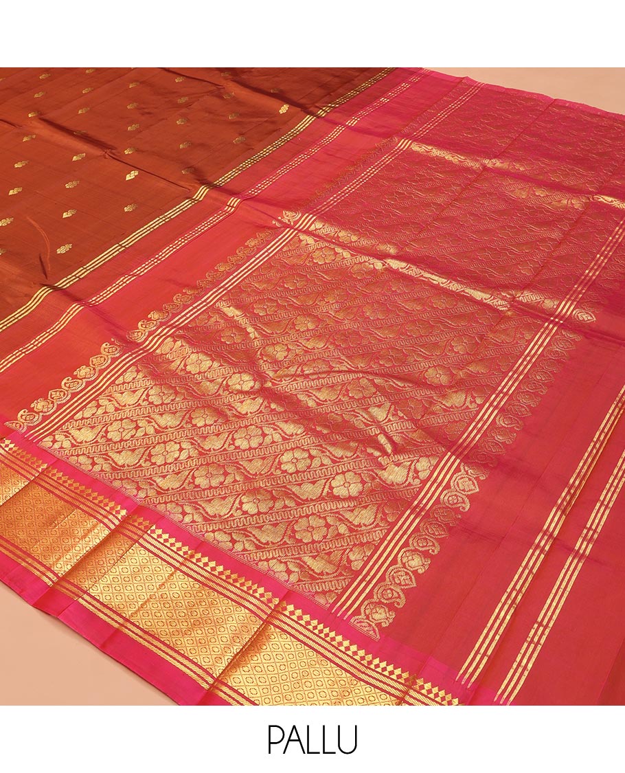 Brown Kanchipuram Silk Saree, Elevated with Zari Buttas on Its Body, Complemented by a Contrast One-Sided Border of Panner Sombu, Banaras, and Mayil Kann Designs, Pallu Features Floral Creeper Designs, and Comes Without a Blouse
