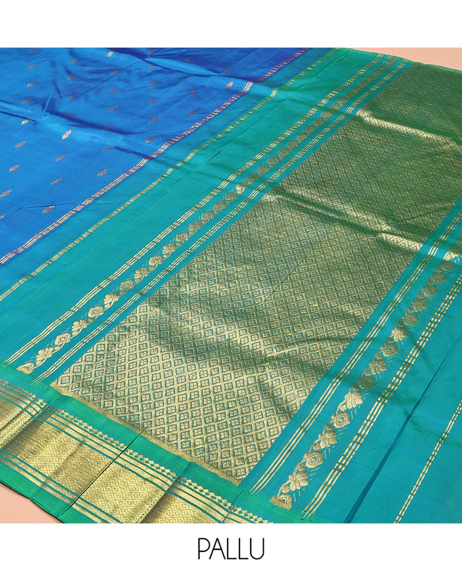 Blue Kanchipuram Silk Saree, Styled with Zari Buttas, Complemented by a Contrast One-Sided Border of Panner Sombu, Banaras, and Mayil Kann Designs, Grand Pallu, and No Blouse