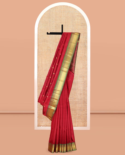 Maroon Zari Buttas Kanchipuram Silk Saree, Complemented by a Contrast One-Sided Border of Panner Sombu, Banaras, Muthu, and Jaal Designs, Zari Design Pallu, and a No Blouse