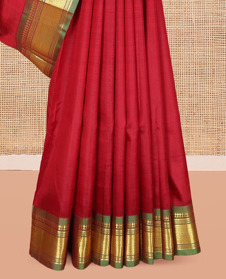 Maroon Zari Buttas Kanchipuram Silk Saree, Complemented by a Contrast One-Sided Border of Panner Sombu, Banaras, Muthu, and Jaal Designs, Zari Design Pallu, and a No Blouse