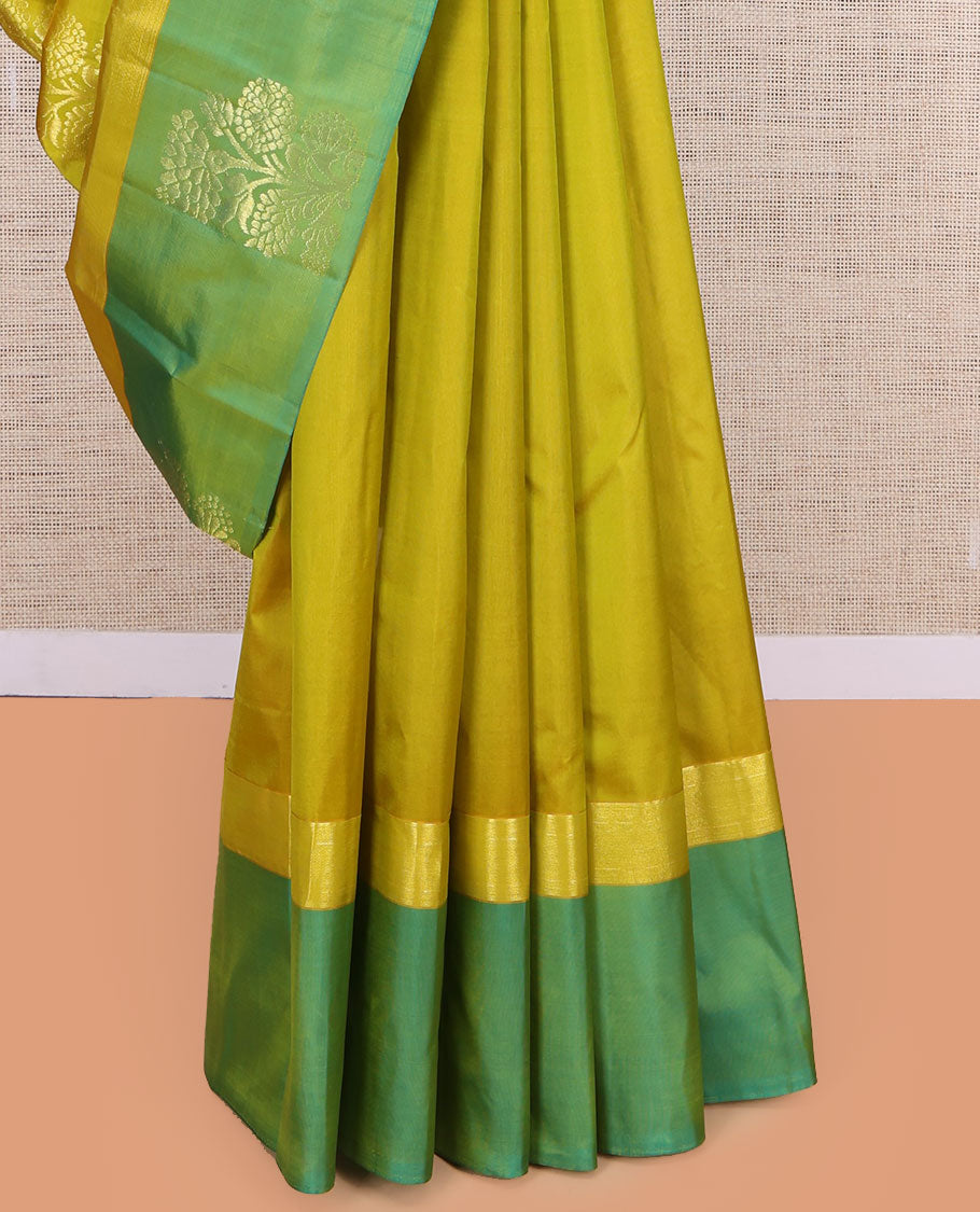 Green Kanchipuram Silk Saree, Woven with Floral Zari Buttas, a Contrast Floral Zari Design Border, Floral Design Pallu, and a Contrast Blouse