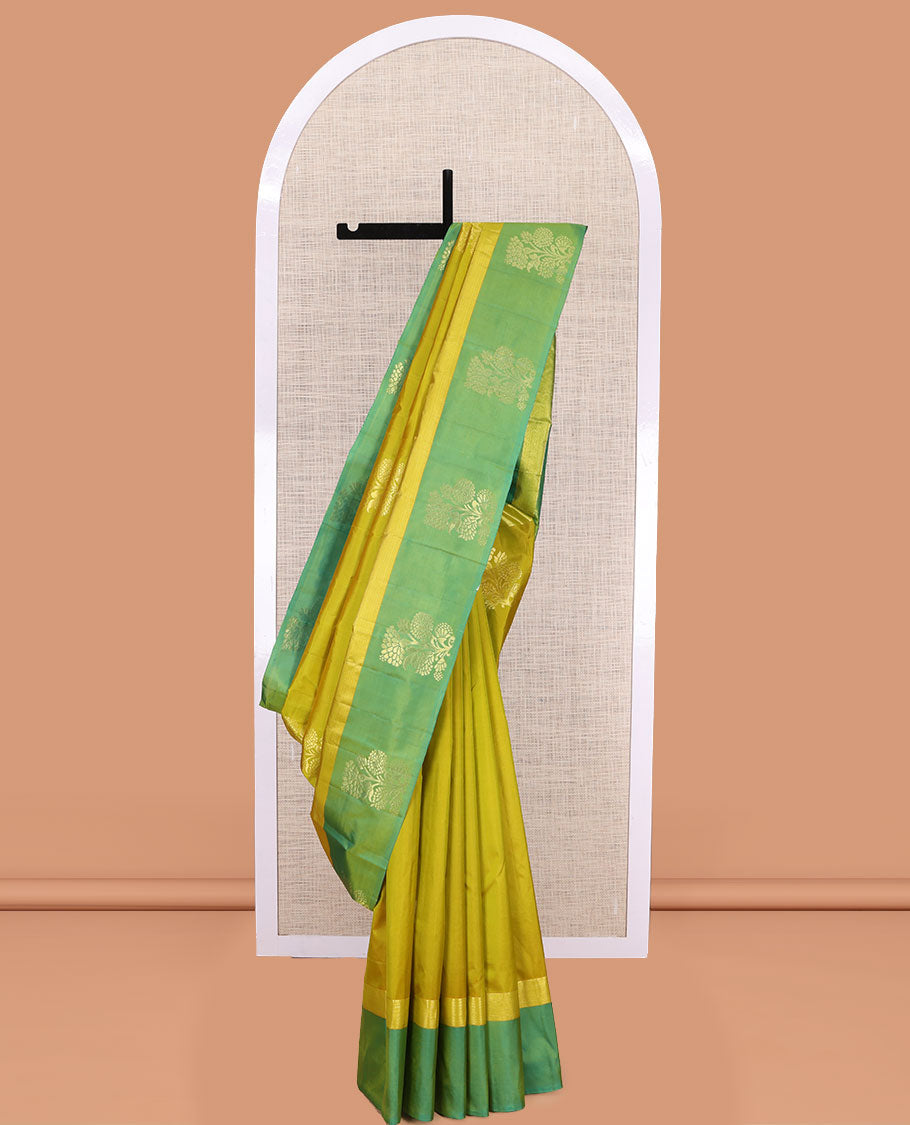 Green Kanchipuram Silk Saree, Woven with Floral Zari Buttas, a Contrast Floral Zari Design Border, Floral Design Pallu, and a Contrast Blouse
