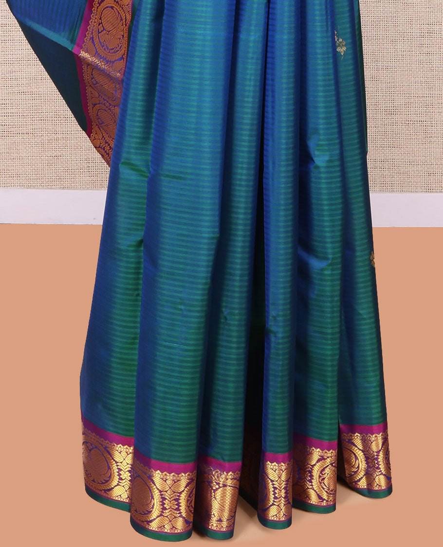 Blue Kanchipuram Silk Saree, Elevated with Vazhaipoo Stipes and Zari Buttas, a Contrast Traditional Mayil Motif Border, Pallu of Zari Design, and Contrast Blouse