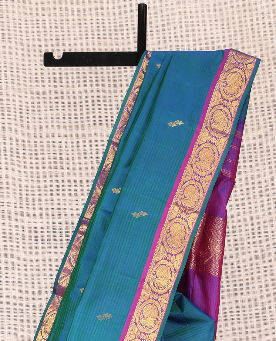 Blue Kanchipuram Silk Saree, Elevated with Vazhaipoo Stipes and Zari Buttas, a Contrast Traditional Mayil Motif Border, Pallu of Zari Design, and Contrast Blouse