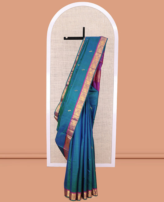 Blue Kanchipuram Silk Saree, Elevated with Vazhaipoo Stipes and Zari Buttas, a Contrast Traditional Mayil Motif Border, Pallu of Zari Design, and Contrast Blouse