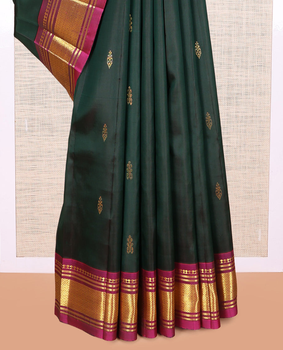 Green Kanchipuram Silk Saree, Woven with Zari Buttas, a Contrast One-sided Border of Panner Sombu, Banaras, and Mayil Kann Designs, Pallu of Zari Designs, and No Blouse