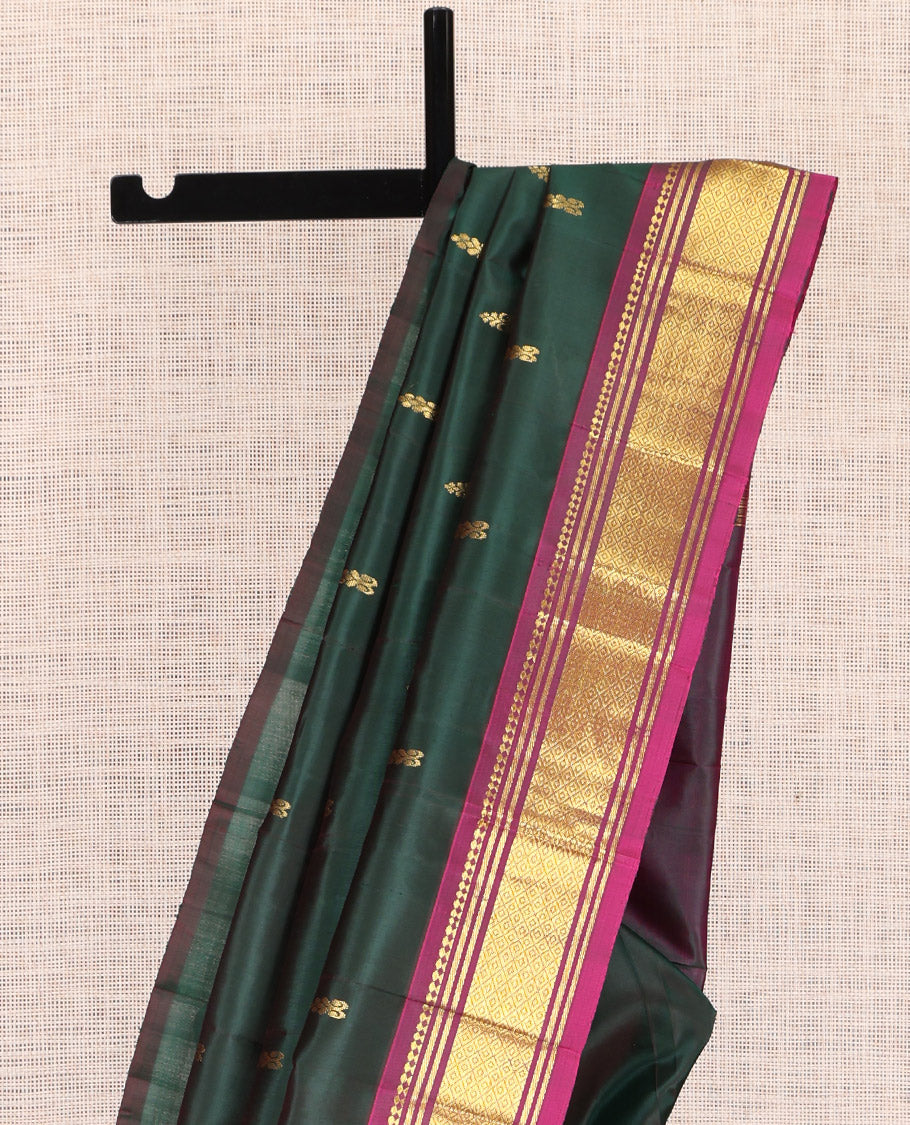 Green Kanchipuram Silk Saree, Woven with Zari Buttas, a Contrast One-sided Border of Panner Sombu, Banaras, and Mayil Kann Designs, Pallu of Zari Designs, and No Blouse