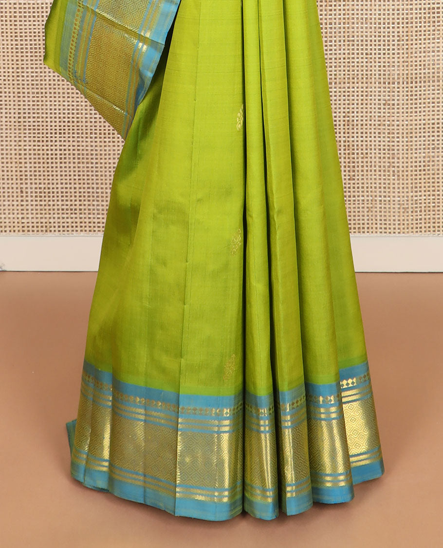 Parrot green zari buttas kanchipuram silk saree, contrast one-sided border of panner sombu,banaras & jaal & floral design pallu