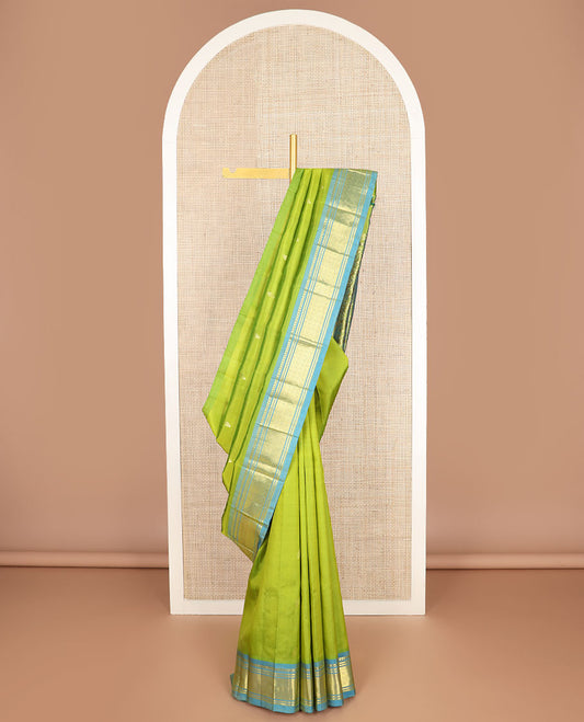 Parrot green zari buttas kanchipuram silk saree, contrast one-sided border of panner sombu,banaras & jaal & floral design pallu