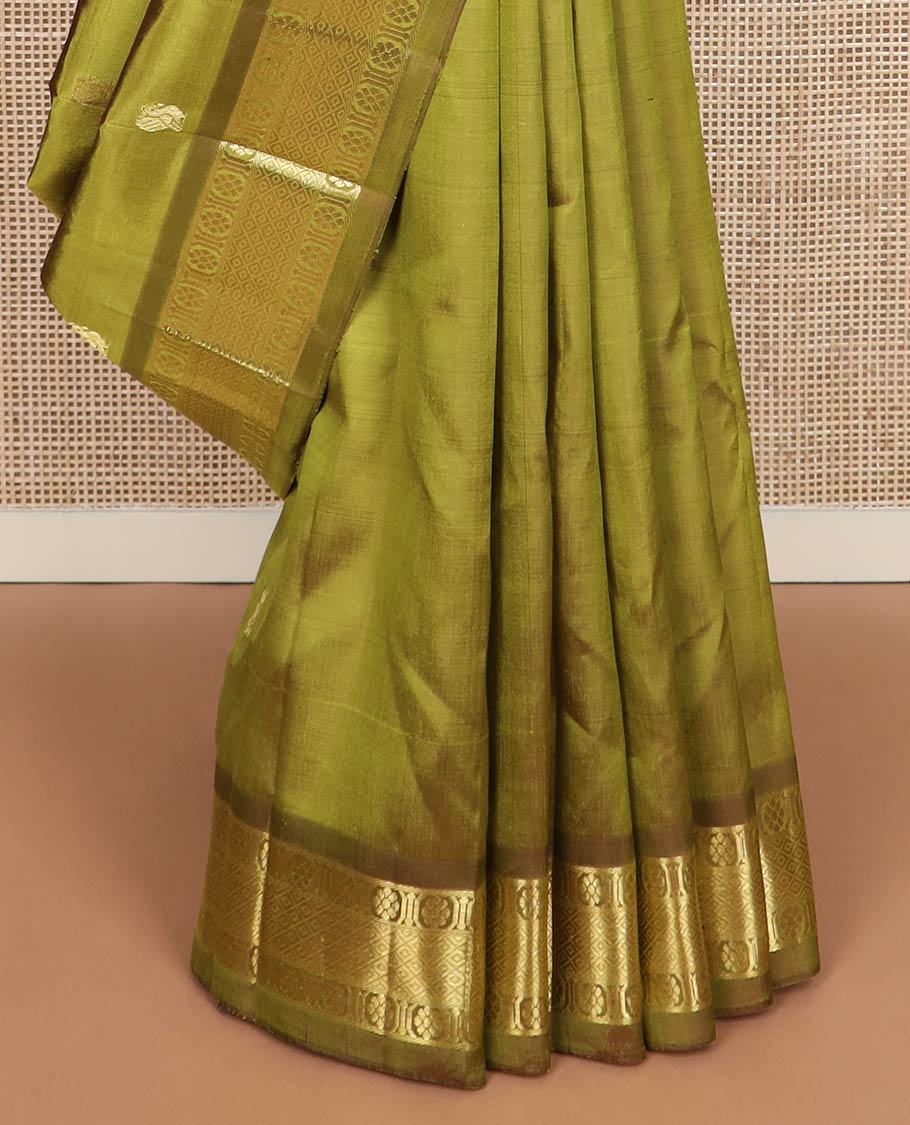 Green zari buttas kanchipuram silk saree, contrast one-sided border of mayil kann & laddu kamalam designs & zari woven pallu
