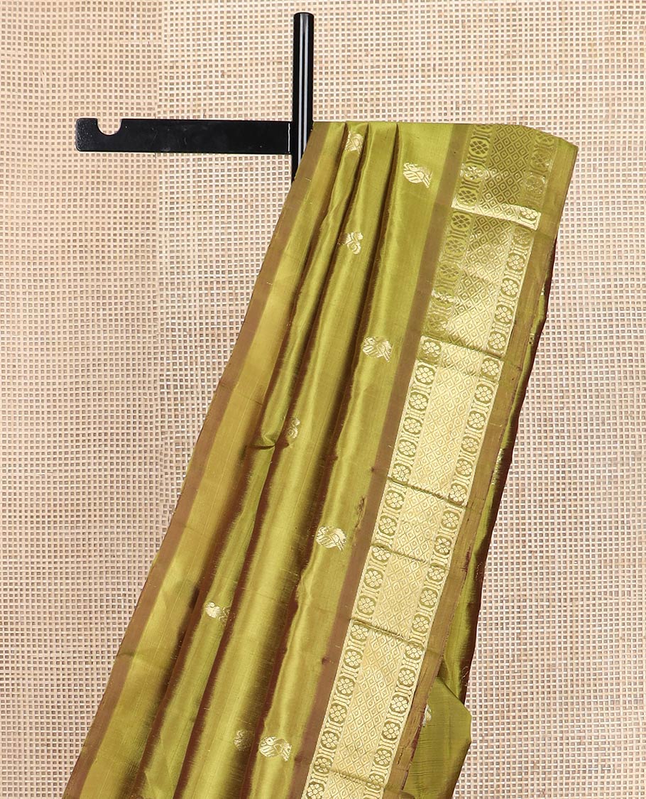 Green zari buttas kanchipuram silk saree, contrast one-sided border of mayil kann & laddu kamalam designs & zari woven pallu