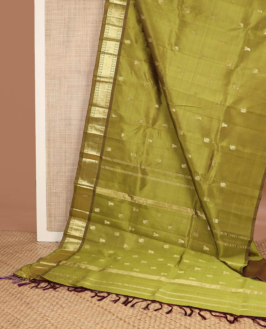 Green zari buttas kanchipuram silk saree, contrast one-sided border of mayil kann & laddu kamalam designs & zari woven pallu