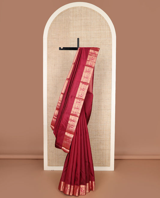 Crimson plain Kanchipuram silk saree, zari border of Muthu, mayil kann & yaanai designs & jaal pallu