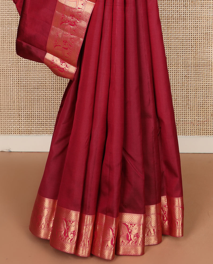 Crimson plain Kanchipuram silk saree, zari border of Muthu, mayil kann & yaanai designs & jaal pallu