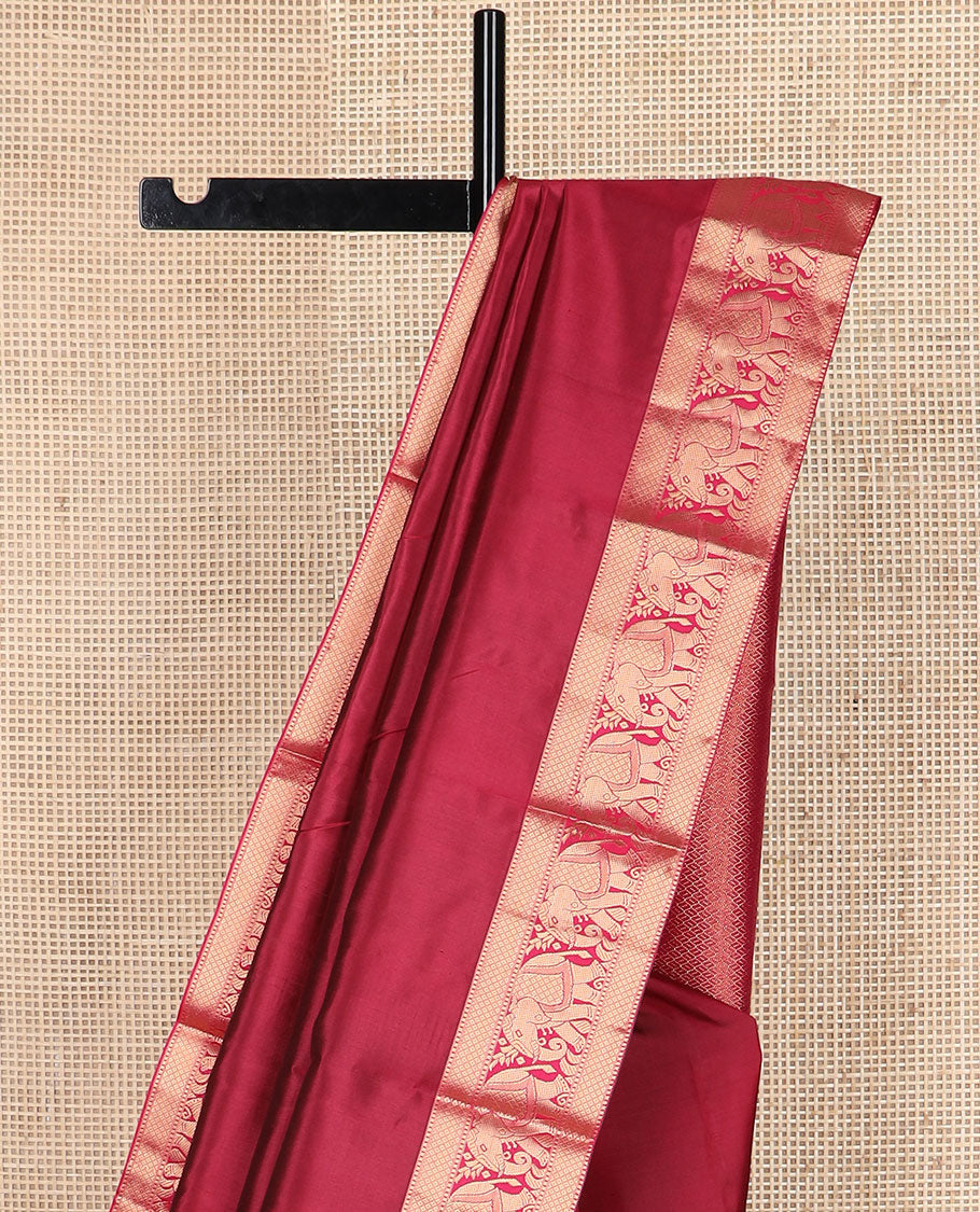 Crimson plain Kanchipuram silk saree, zari border of Muthu, mayil kann & yaanai designs & jaal pallu