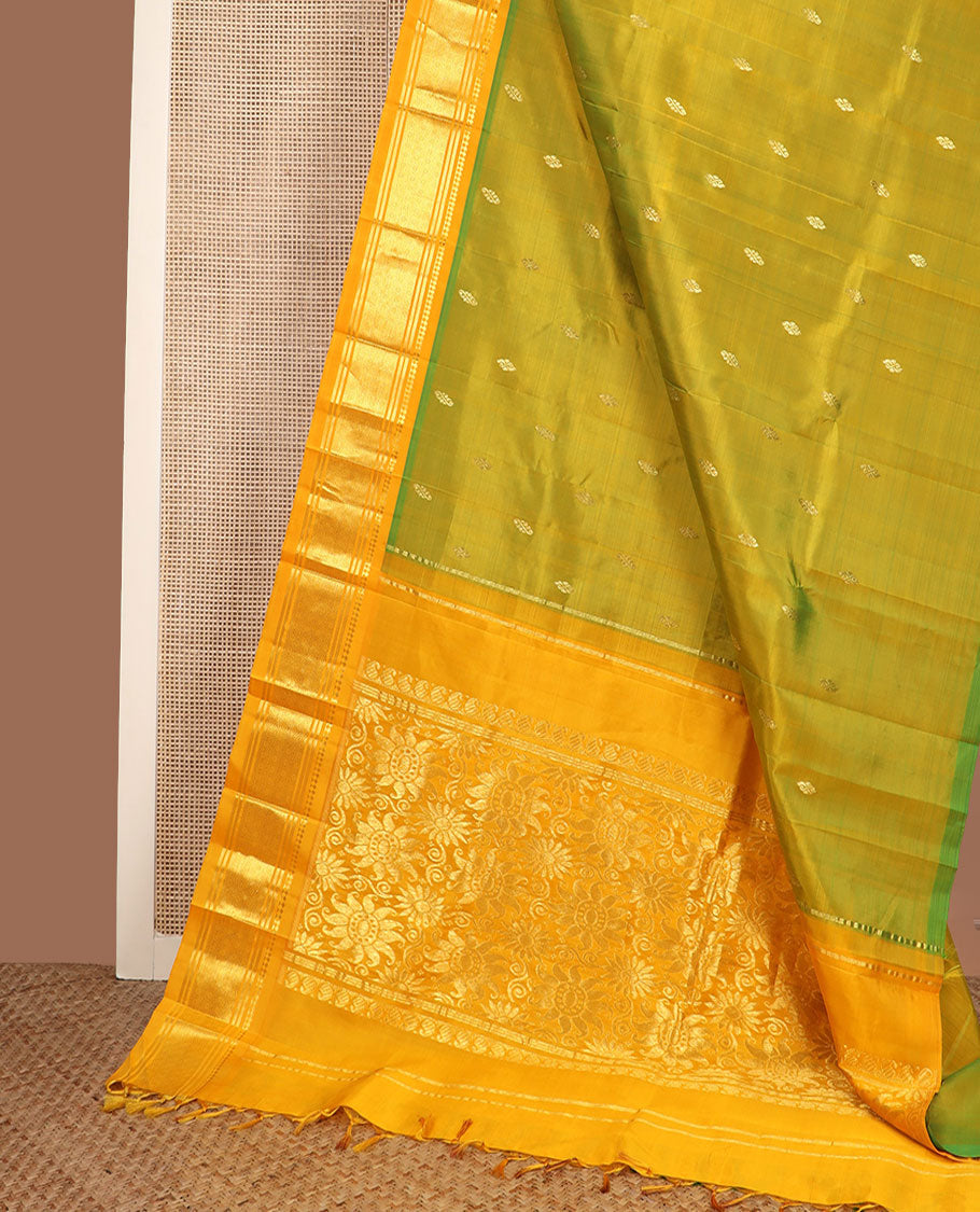 Green buttas Kanchipuram silk saree, contrast border of panner sombu, banaras & jaal design & floral design pallu