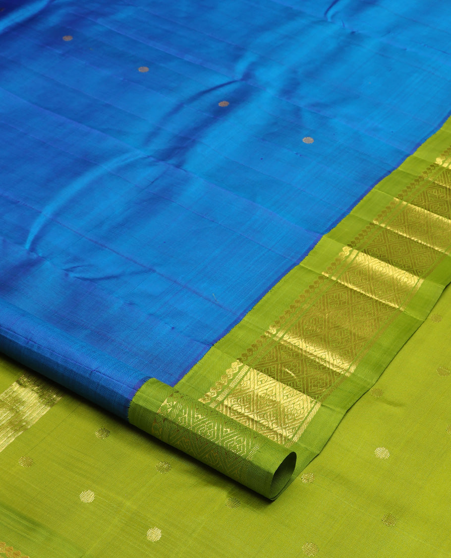 Blue zari buttas Kanchipuram silk saree, contrast one-sided korvai border of salngai, banaras and jaal design, and zari woven pallu