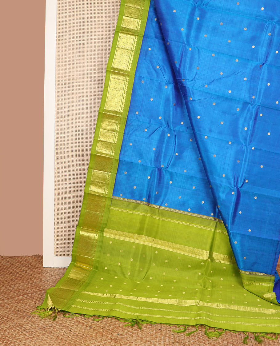 Blue zari buttas Kanchipuram silk saree, contrast one-sided korvai border of salngai, banaras and jaal design, and zari woven pallu
