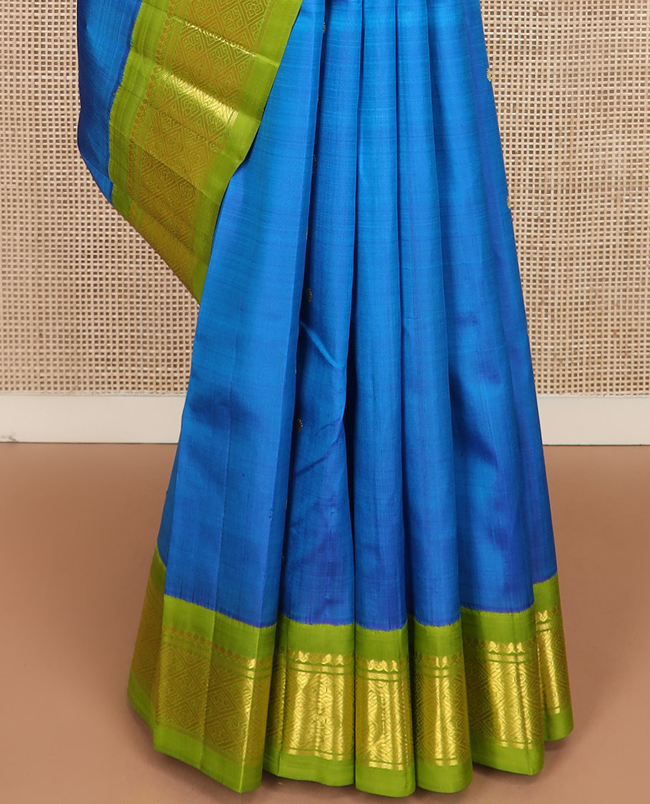 Blue zari buttas Kanchipuram silk saree, contrast one-sided korvai border of salngai, banaras and jaal design, and zari woven pallu