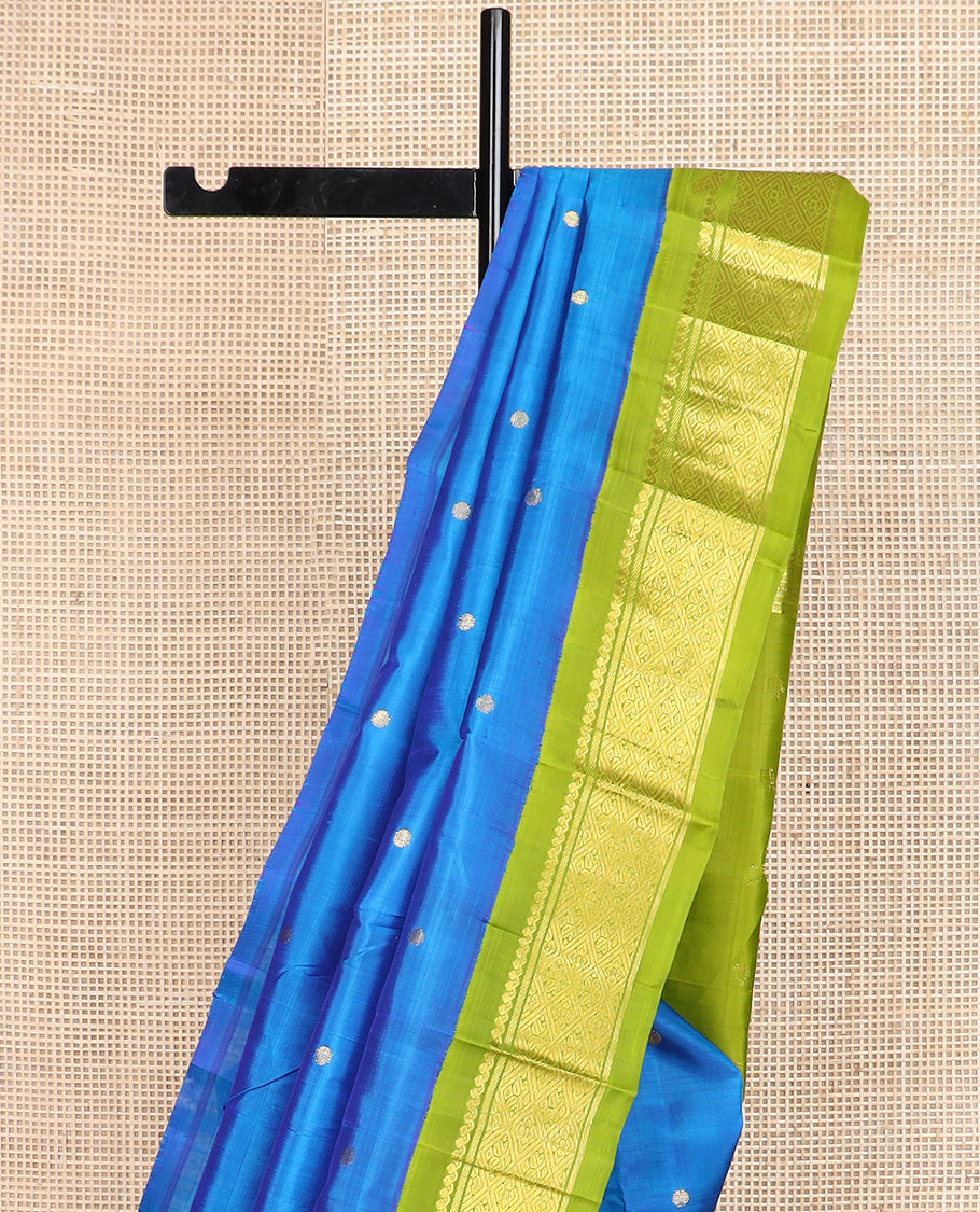 Blue zari buttas Kanchipuram silk saree, contrast one-sided korvai border of salngai, banaras and jaal design, and zari woven pallu