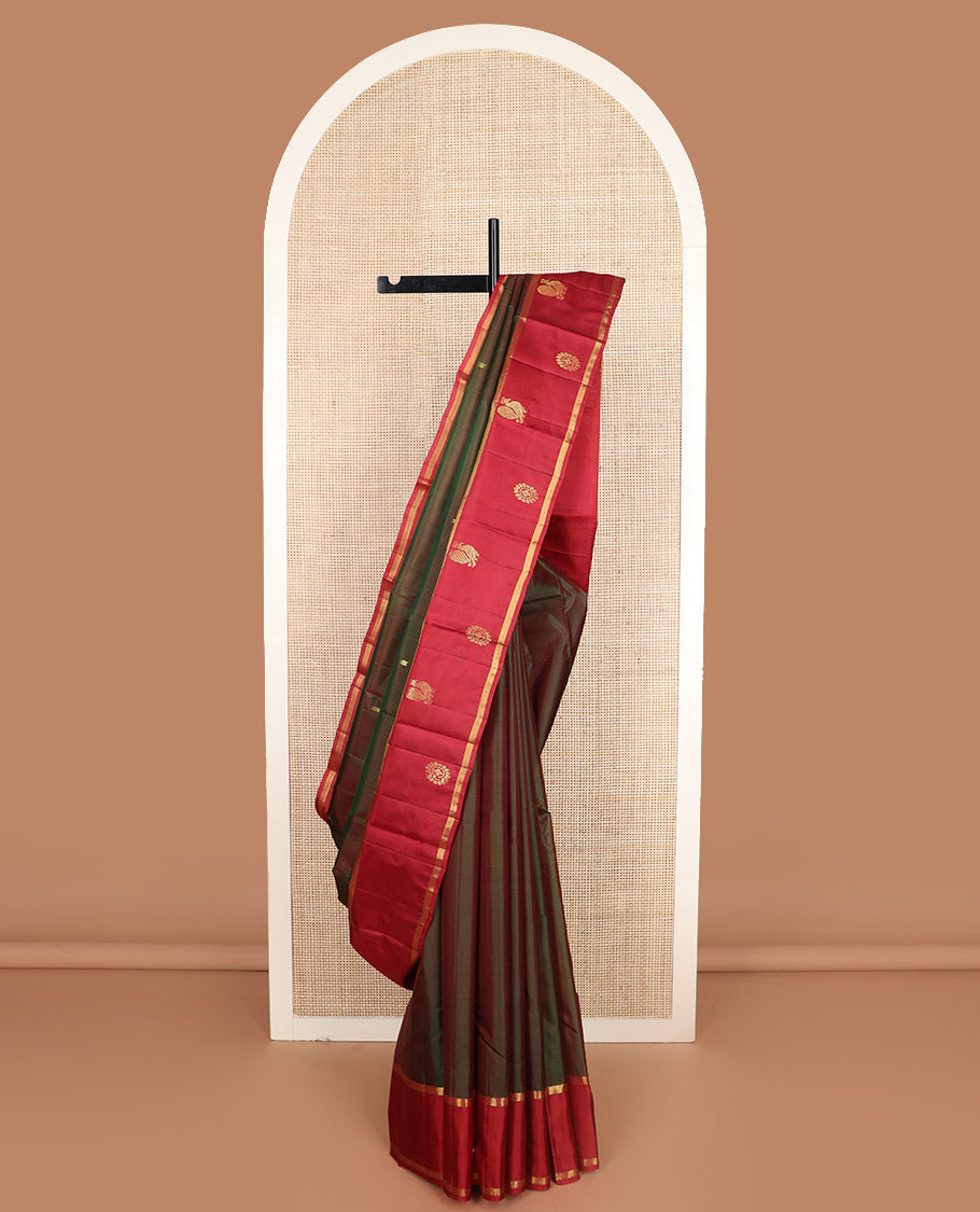 Green zari buttas Kanchipuram silk saree, contrast Mayil chakram zari design border, and zari design pallu