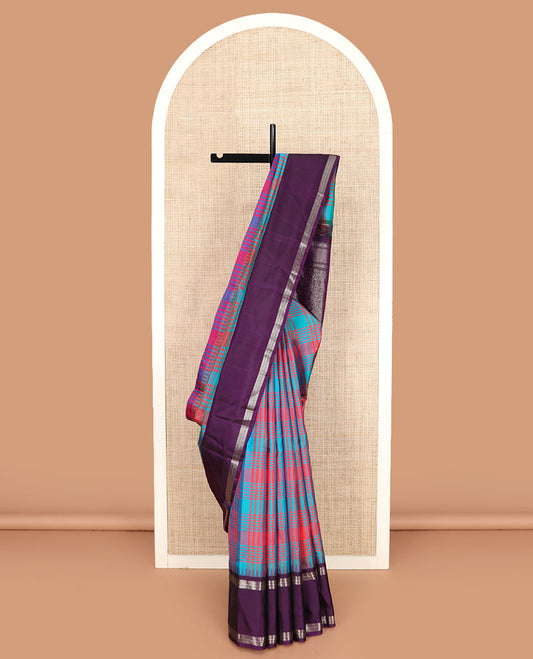 Multi-color checked Kanchipuram silk saree, contrast thazampoo rekku rettai pettu border, and vanasingaram-style flora-fauna motifs woven pallu