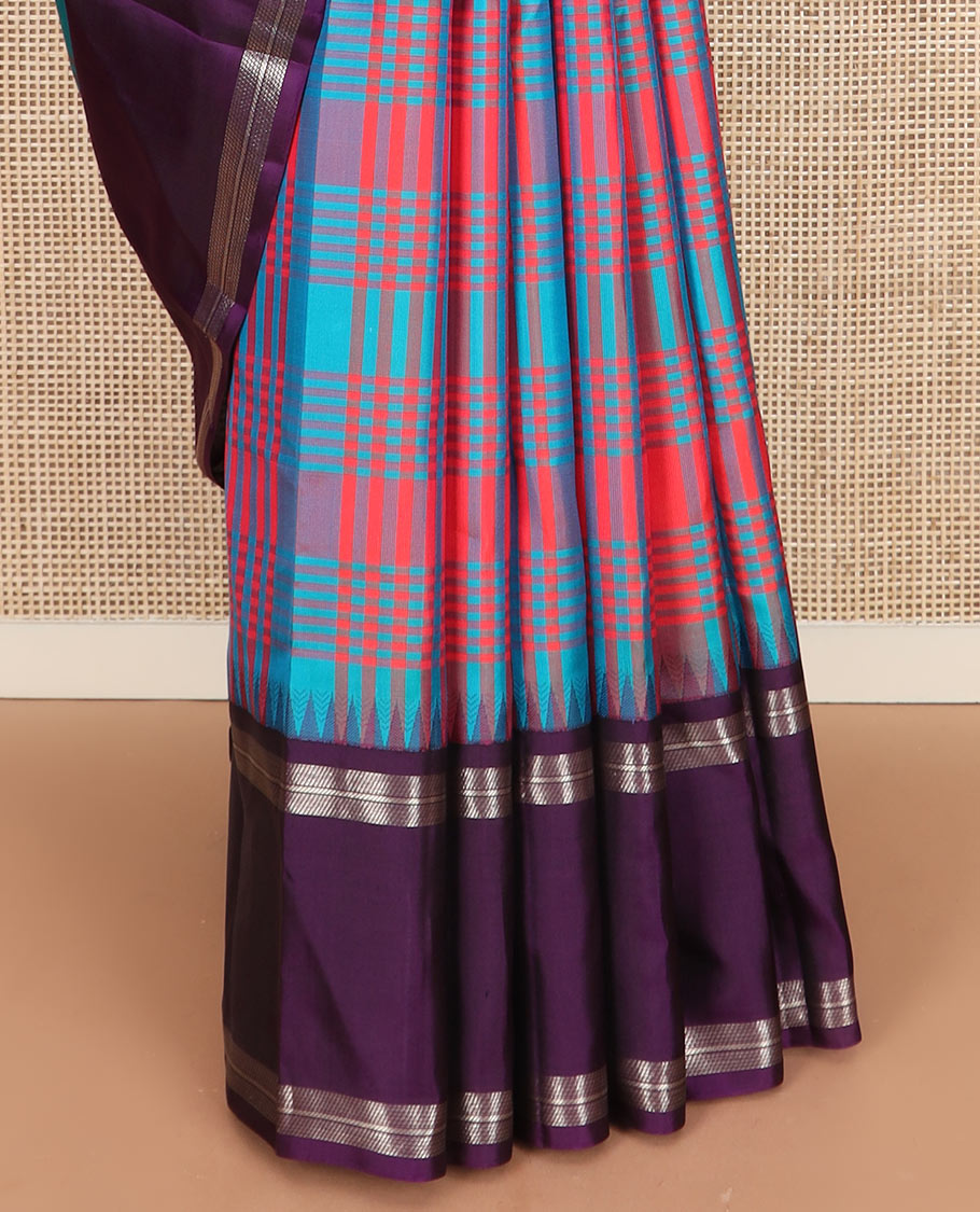 Multi-color checked Kanchipuram silk saree, contrast thazampoo rekku rettai pettu border, and vanasingaram-style flora-fauna motifs woven pallu