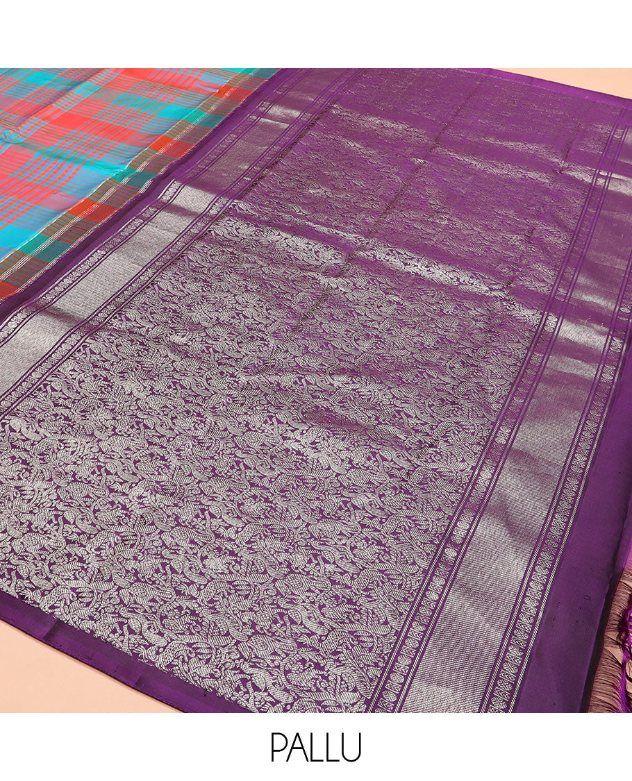 Multi-color checked Kanchipuram silk saree, contrast thazampoo rekku rettai pettu border, and vanasingaram-style flora-fauna motifs woven pallu