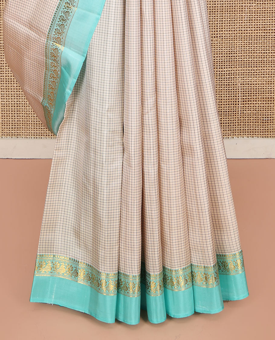 Off-White Kanchipuram Silk Saree, Accentuated with Micro-Checked Design All Over Its Body, Complemented by Contrast Kal Erangina Border of Thilakam Mokku, Banaras, Muthu, and Mayil Designs, Subtly Zari Striped Pallu, and Paired with a Contrast Blouse