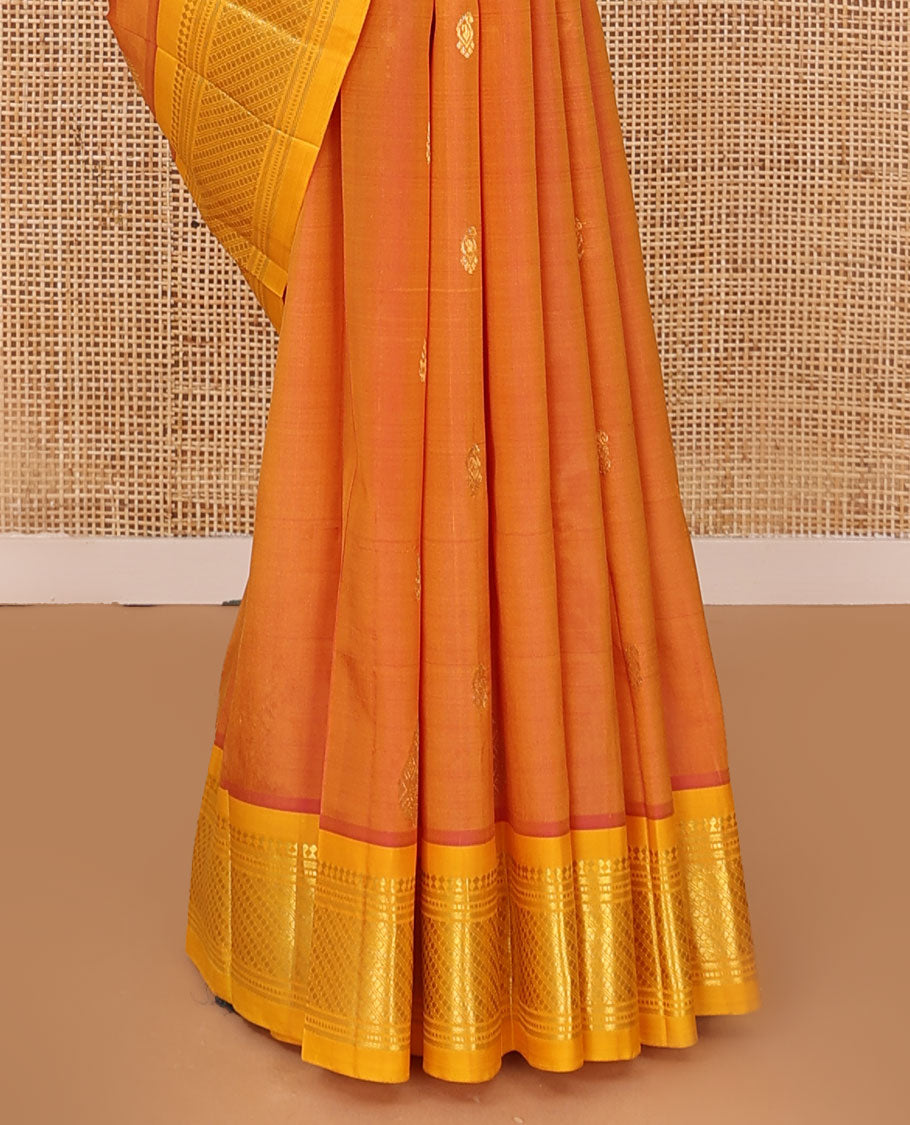Orange zari buttas Kanchipuram silk saree, contrast one-sided border of panner sombu,banaras,muthu & godhumai kann & floral design pallu