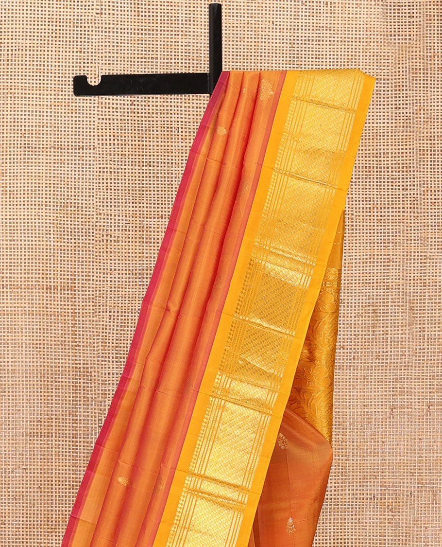 Orange zari buttas Kanchipuram silk saree, contrast one-sided border of panner sombu,banaras,muthu & godhumai kann & floral design pallu