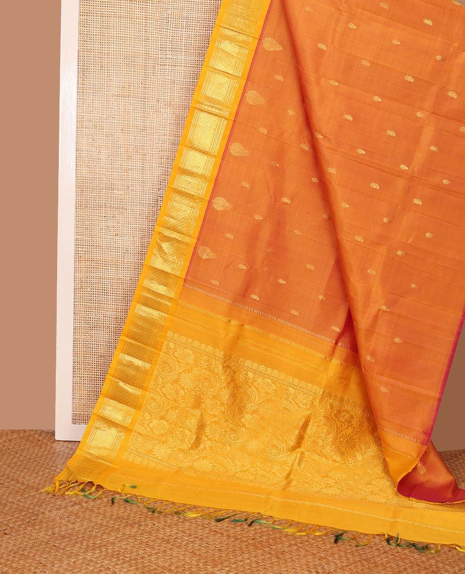 Orange zari buttas Kanchipuram silk saree, contrast one-sided border of panner sombu,banaras,muthu & godhumai kann & floral design pallu