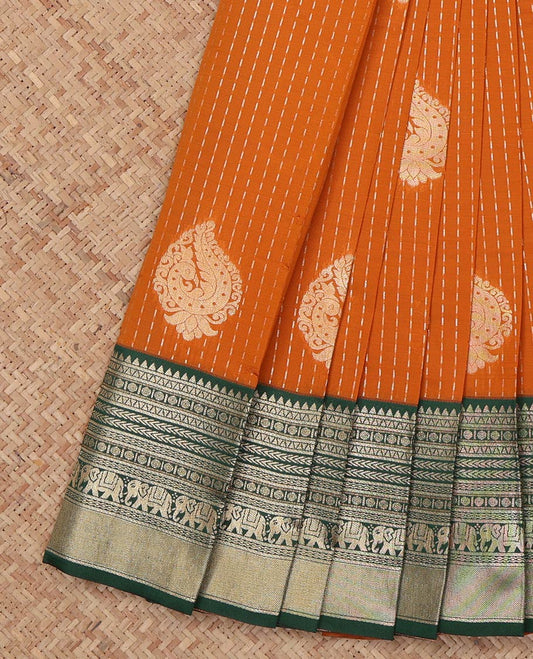 Orange Litchi Saree, Beautified with Zari Buttas, a Contrast Traditional Zari Border, Grand Pallu, and a Contrast Blouse