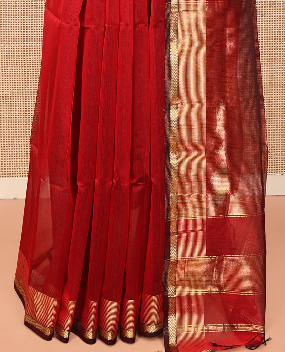 Red Maheshwari Cotton Saree, Ornamented with Zari Buttas on Its Body, Highlighted by Traditional Zari Border, Scintillating Pallu Steeped with Zari Stripes, and Paired with a Matching Blouse