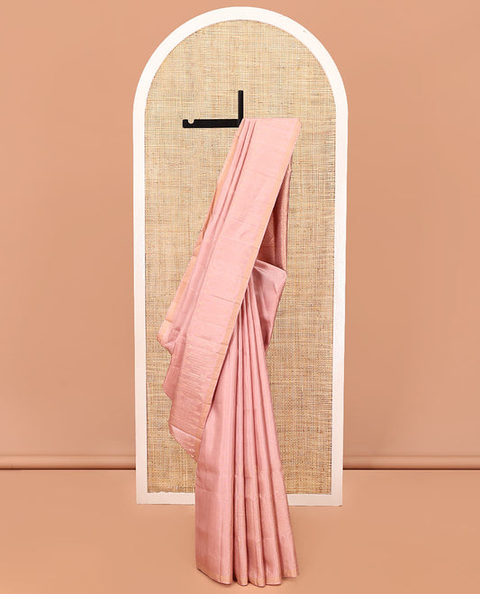 Pink Mayuri Soft Silk Saree, Impeccably Styled with Floral Designs All Over Its Body, Subtle Zari Piping Border, Sparsely Sparkled Pallu, and Paired with a Matching Blouse