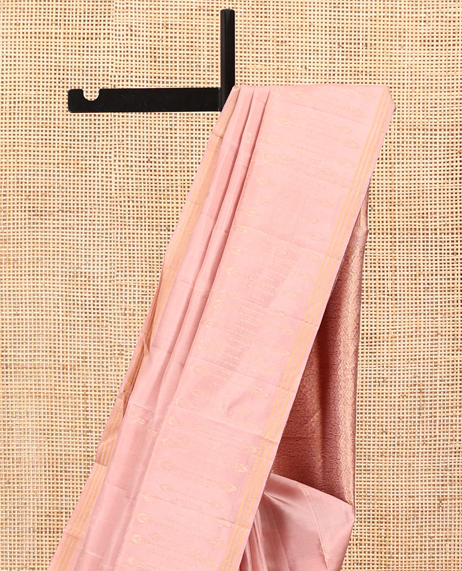 Pink Mayuri Soft Silk Saree, Impeccably Styled with Floral Designs All Over Its Body, Subtle Zari Piping Border, Sparsely Sparkled Pallu, and Paired with a Matching Blouse