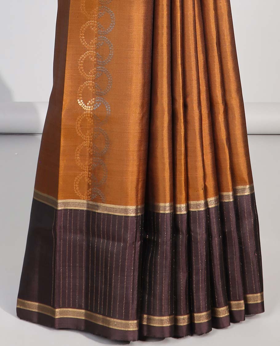 Brown intricate design soft silk saree with contrast striped border & leaf design pallu
