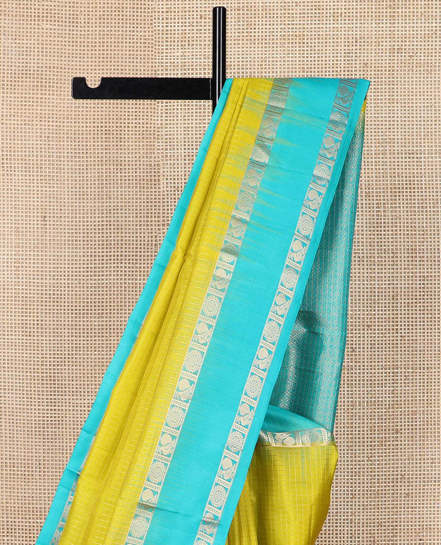 Parrot green checked soft silk saree, contrast annam chakram design rettai pettu border & ogee patterned pallu