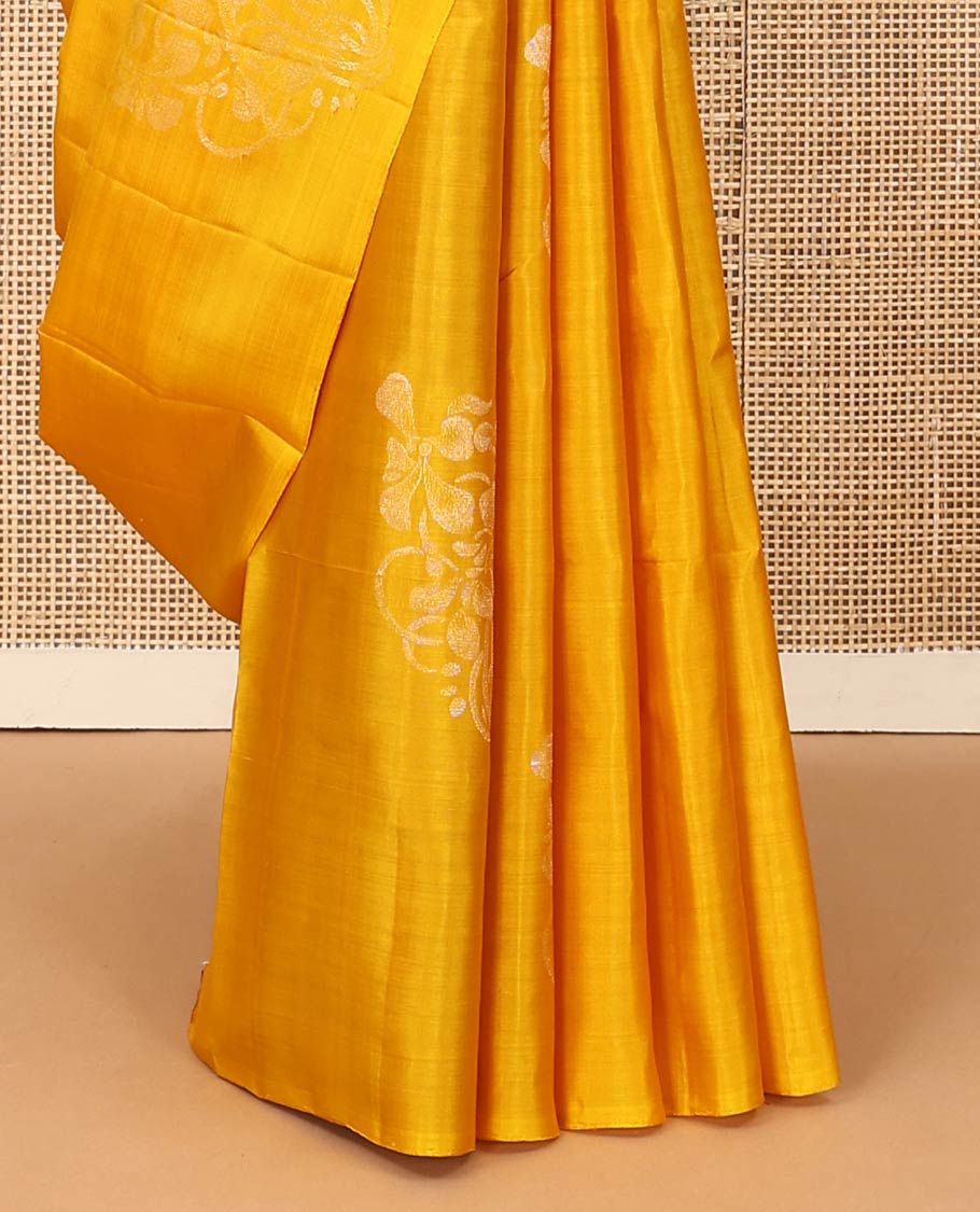 Borderless mango yellow floral buttas woven soft silk saree, contrast pallu of floral and chevron designs