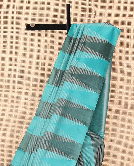 Blue Mayuri Soft Silk Saree, Subtly Sparkled with Thread Stripes All Over Its Body, Thazampoo Rekku Border, Sparsely Woven Pallu of Seppu Rekku Designs, and Paired with a Matching Blouse